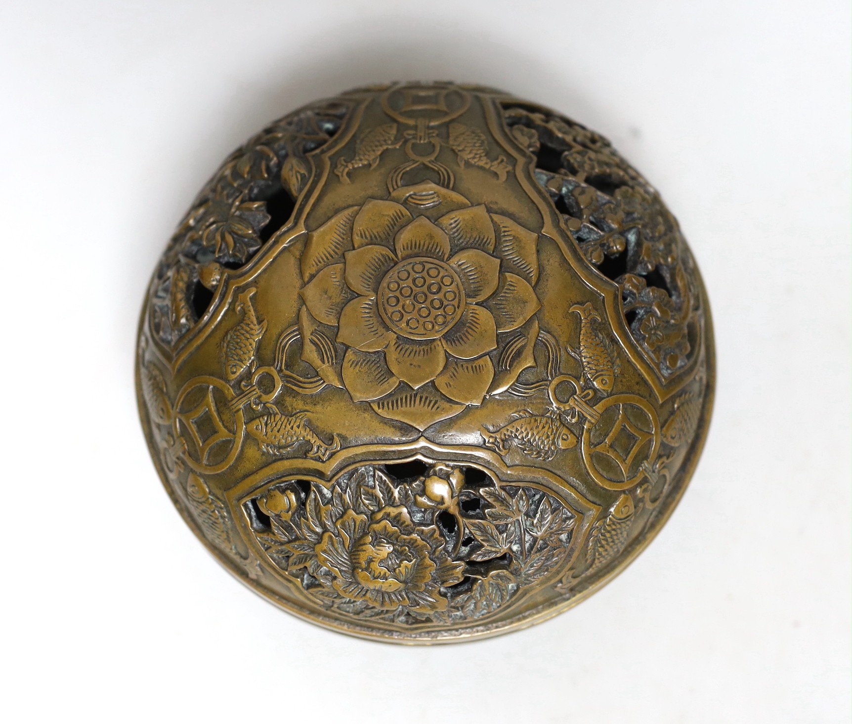A Chinese circular carved bronze censer, 13.5cm diameter